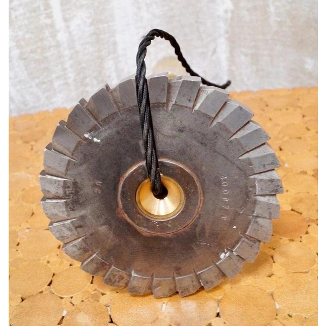 A striking antique industrial table lamp created from a 19th-century candy drop roller, originally used in the manufacture...