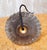 A striking antique industrial table lamp created from a 19th-century candy drop roller, originally used in the manufacture...