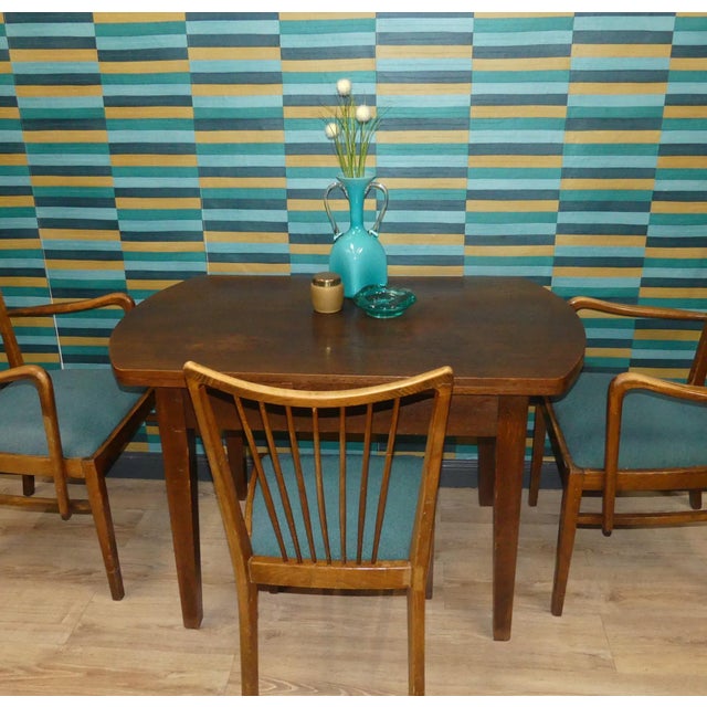Simple, sturdy Dining table Understated style and exceptionally practical: Extendable to a full-size dining table...