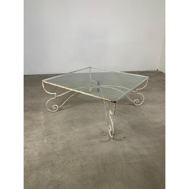Iron coffee table with original finish, square transparent glass, France, 1960s Solid iron frame with original finish and...