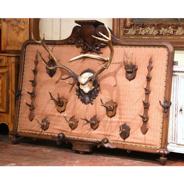 Commanding in scale and rich in sporting character, this antique hunting trophy wall rack creates a dramatic architectural...
