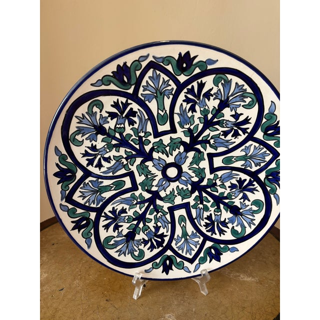 Handcrafted in Nabeul, Tunisia, this plate features a vibrant blue/green Moorish geometric pattern. This plate has been...