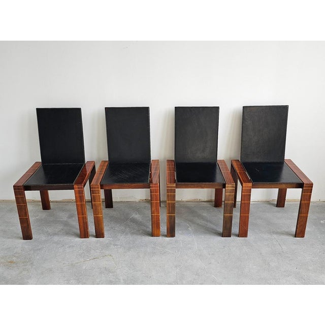 In this listing you will find a set of 4 Mid Century Modern Dining Chairs designed in style of Afra and Tobia Scarpa....