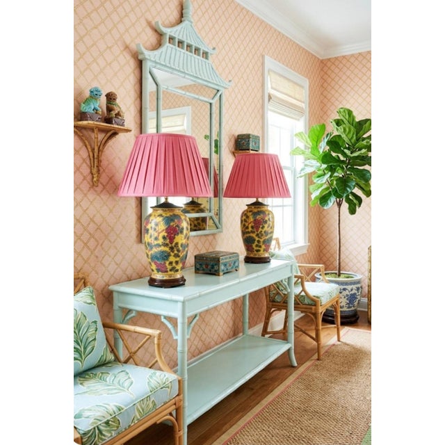 A beautiful pair of chinoiserie floral gold inlay table lamps. The lamps feature bright pretty colors, which includes...