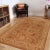 Mesmerizing intricacy and a gorgeous color palette, this hand-knotted masterpiece is a semi-Vintage distressed vintage...