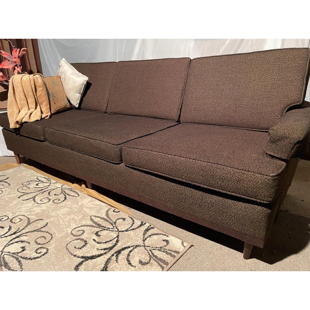 This vintage mid century modern sofa by Baker Schwartz Manufacturing is a true gem of the mid-century design era. It...