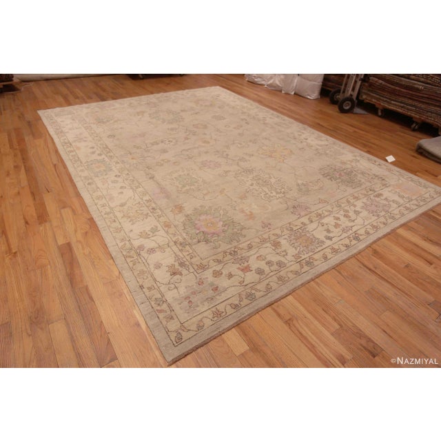 Decorative Neutral Tribal Floral Modern Turkish Oushak Design Area Rug, Country of origin: Central Asia, Circa date:...