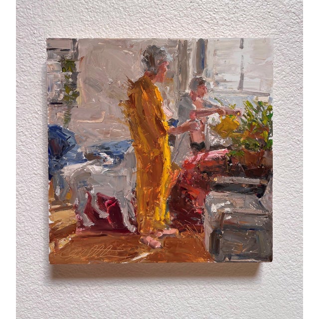 This artwork depicts two figures engaged in a moment of domestic activity, surrounded by a vibrant interplay of light and...