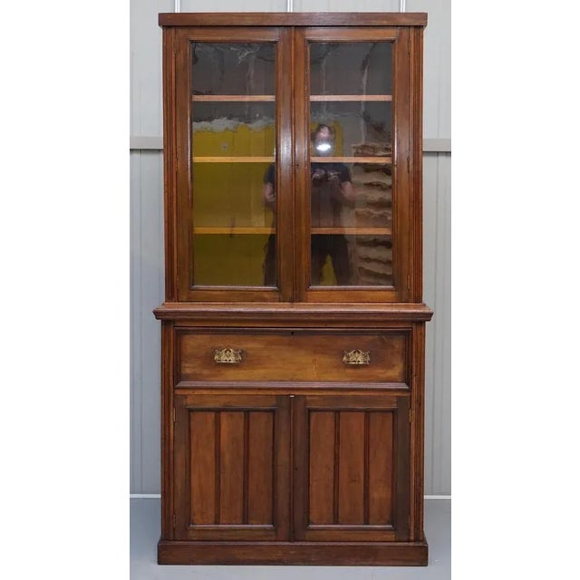 We are delighted to offer this stunning circa 1880 light mahogany library bookcase with secrétaire desk A well made and...