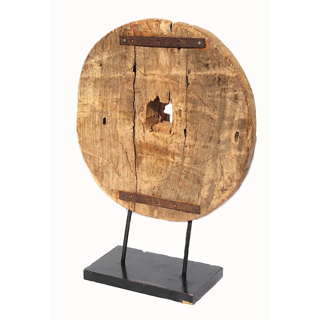 Antique Chinese Wooden Cart Wheel, 19th C. or earlier, with metal fastenings, square hole for attaching to the axel,...