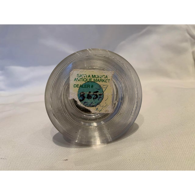 Turn-of-the-century British glass match striker with silver top. Purchased in London in the late 1980s.