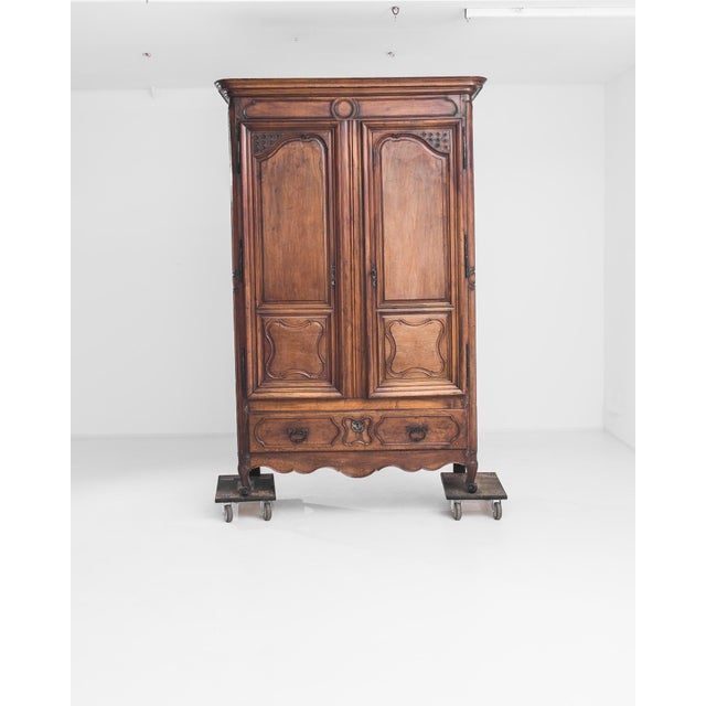 Elegant lines and a wealth of charming details gives this antique cabinet a perennial freshness. Made in France in the...