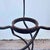 Iron flowerpot with a sinuous and refined design, perfect for home decorations. Height: 78 Width: 30 Depth: 30 This piece...