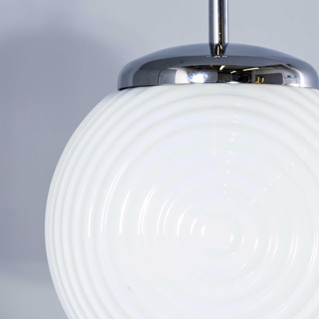 1940's original mouth blown ribbed opaline pendant lamps. Beautiful original ribbed opaline pendant lamps featuring mouth-...