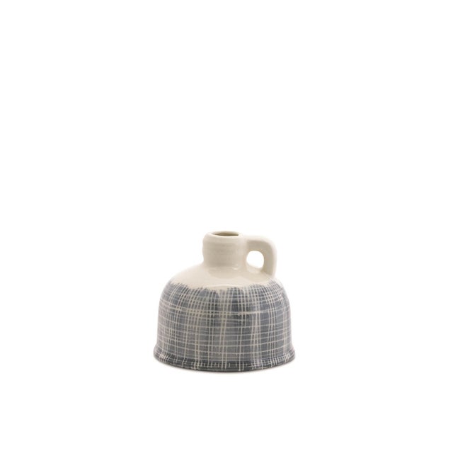 Elevate your home decor with this beautiful Set of Terra Cotta Jug Vases. Each vase features a unique size and a striking...