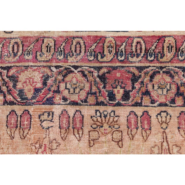 This exquisite antique rug, sourced from Doris Leslie Blau, showcases a rare blend of history and craftsmanship. The...