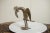 :: Vintage handmade African bronze bird. Circa mid 20th century and possibly older, each figure in this collection...