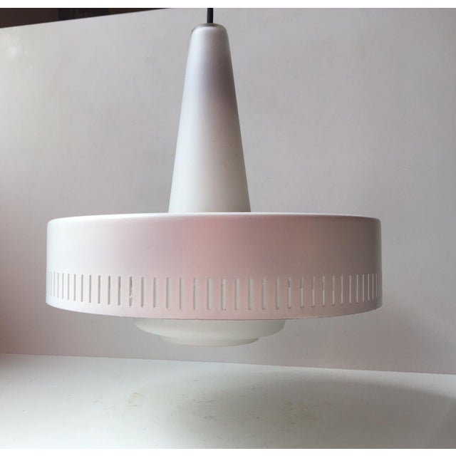 This Danish light was designed by Bent Karlby for Lyfa, Denmark and manufactured in the late 1950s. The light consists of...