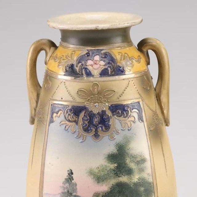Dating to the late 1800's / Early 1900's. Porcelain Meiji period Japanese hand painted and gilt vase. Note raised gold...