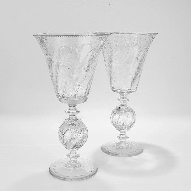 A fine pair of pairpoint footed vases. In the Ardsley pattern with a "rock crystal" etched design throughout. Designed and...