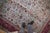Allover covered field in a forest theme with prancing deer, leopards, and intricate floral cross-sections, palmettes,...