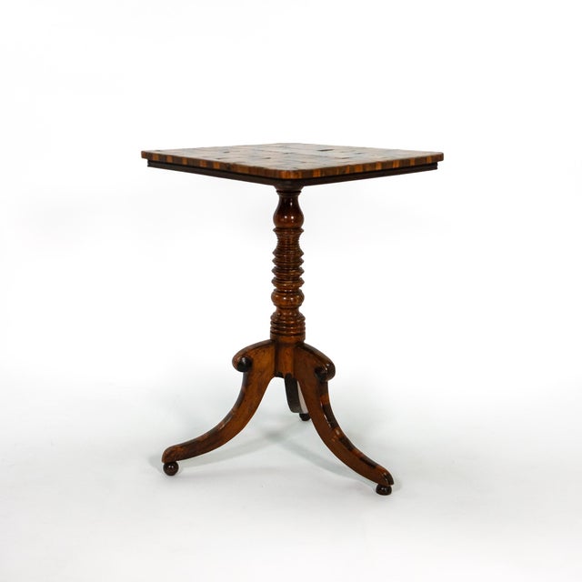 Rectangular games table with an inset chessboard veneered in alternating light and dark woods within a border of oyster...