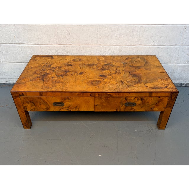 Make a bold statement with this striking mid-century modern burl veneer coffee table, a perfect fusion of organic beauty...