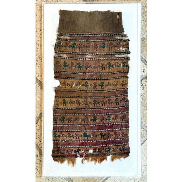 A large fragment of antique pre-Columbia textile panel from Chimu or Chancay culture located in Central and Northern Coast...