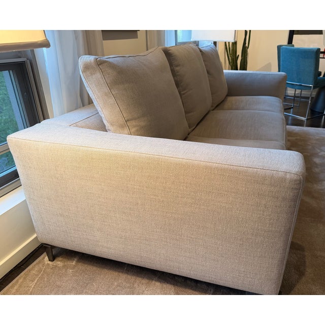 Elegant and timeless Minotti Anderson sofa designed by Rodolfo Dordoni. This piece embodies the clean, tailored aesthetic...