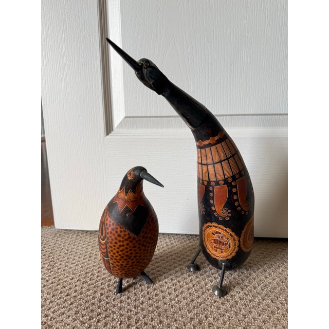Vintage Peruvian "Mate Burilado" Carved Gourd Bird Sculptures Set of 2 Measurements: Large Bird: 5.0" W × 5.0" D × 16.0" H...