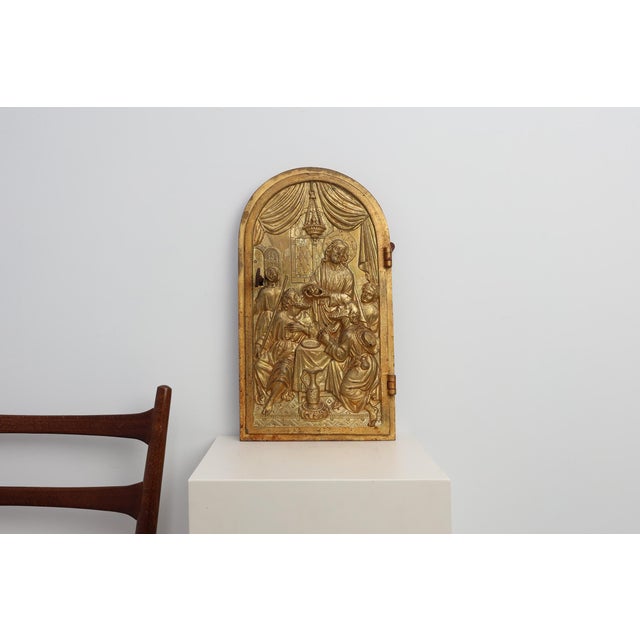A richly detailed Neo‑Gothic tabernacle door from France, dating to around 1880 and centred with an expressive gilded...