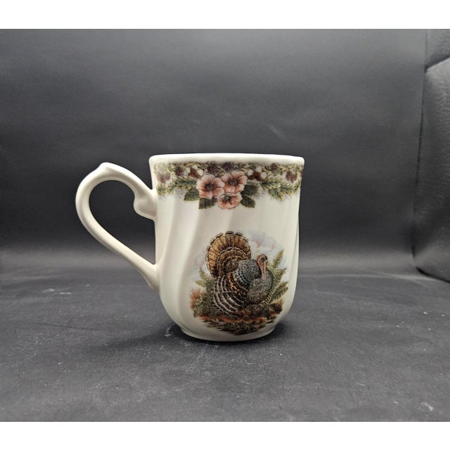This marvelous vintage 1990s coffee or tea mug was made by Queens Churchill from archival designs by Myott and is created...