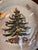 A festive set of 16 Spode “Christmas Tree” luncheon/dessert plates by Creative Papers. Featuring the iconic Christmas Tree...