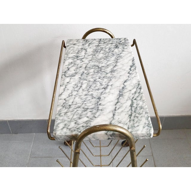 Fair condition. Shows normal wear and tear, oxidation, particularly on the metal parts of the wheels, chips and wear on...