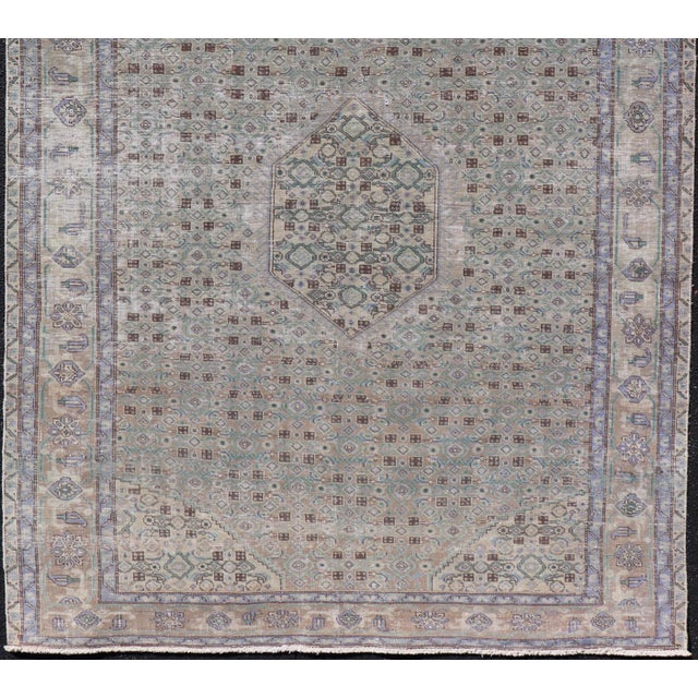 Vintage Persian Tabriz Rug With Floral Medallion in Earthy Tones With Brown. Keivan Woven Arts / rug MSE-1131, country of...