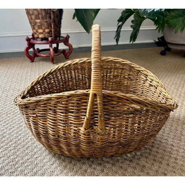 Large vintage French wicker market basket. Imagine it displaying bread in a store window. Boulangerie basket with aged...