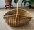 Large vintage French wicker market basket. Imagine it displaying bread in a store window. Boulangerie basket with aged...