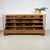This impressive shop counter from Germany (ca. 1930s–1950s) features a solid oak frame and 16 stepped drawers fitted with...