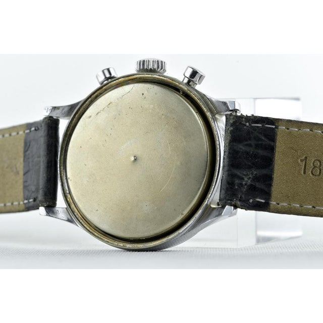 The leonidas chronograph of the 1950s. Black dial, large numbers filled with luminescent material and clear hands filled...