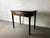A compact, well-made single drawer desk or writing table by Abbess Office Equipment in dark stained oak. Circa 1950s–60s....