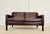 A superb vintage Danish two-seater sofa by Stouby, dating from the 1960s and upholstered in beautifully aged dark cognac...