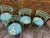 petite set , original paint and some chipping, demilune back rests, work with or without cushions, no maker's mark...