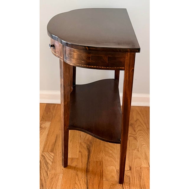 This is a sweet little mahogany Demi lune table beautifully made by Mersman furniture. Lovely beaded inlay and graceful...
