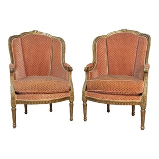 French Louis XVI Style Gilded Wood Bergères Chairs with Carved Décor - a Pair For Sale