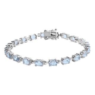 .925 Sterling Silver 11.0 Cttw Oval Shaped Created Light Blue Topaz Link Bracelet - 7 inch For Sale