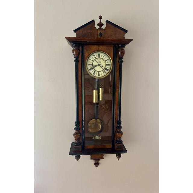 Quality antique Victorian walnut double weight wall clock, having a quality antique Victorian double weight wall clock...