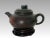 Signed and artist chopped / hall marked fine Yixing Zisha unglazed teapot topped with a Lucky Chinese Peach finial/knob...