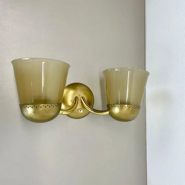 Article: brass theatre wall light Producer: Stilnovo sytle Origin: Italy Age: 1920s This modernist wall light was produced...