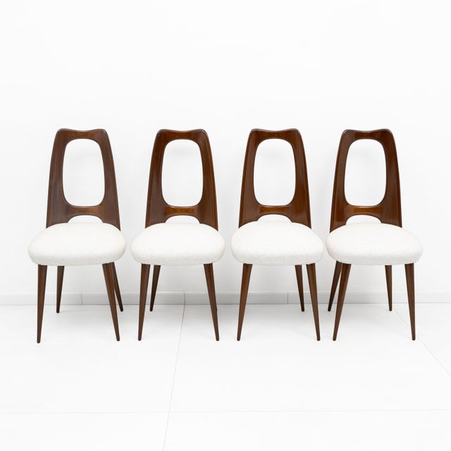 Elegant set of four dining chairs attributed to Vittorio Dassi, representing the refined character of Italian mid-century...