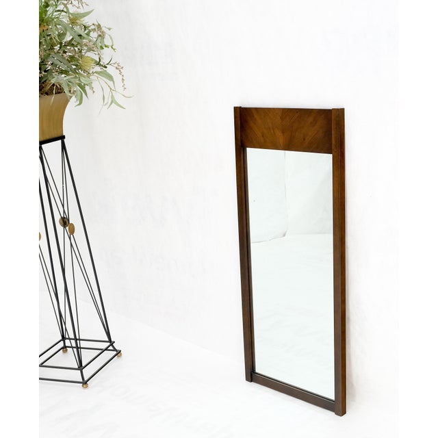 Mid-Century Modern walnut hanging wall mirror.
